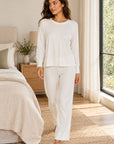 Cannes Pinstripe Long Set in Off-White — Petticoat Lane brunette model, lifestyle photograph