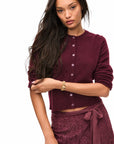 LoveShackFancy Cameryn Cardigan in roasted pomegranate, front view on model against white background