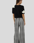 Knit Sweater with Flower Applications in Black