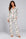 Jolene Holiday Print Long Pj Set — Petticoat Lane brunette model, studio photograph
