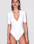 Fleur du Mal Organic Cotton Deep Plunge Bodysuit in Ivory